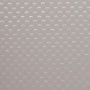 A close-up view of a surface with a regular pattern of small, raised bumps arranged in rows, creating a textured and slightly reflective appearance. The surface is light gray or off-white.