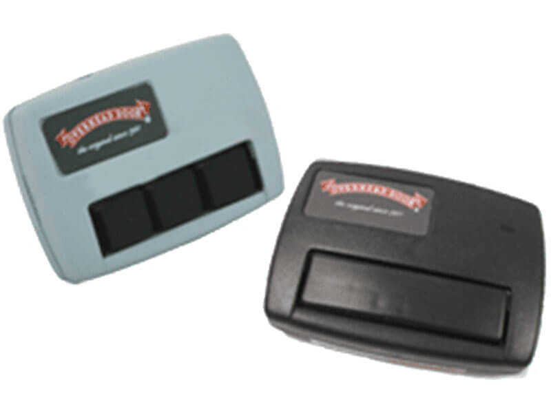 Two rectangular garage door remotes, one gray with three black buttons and one black with a single wide button, both featuring red and white logos.