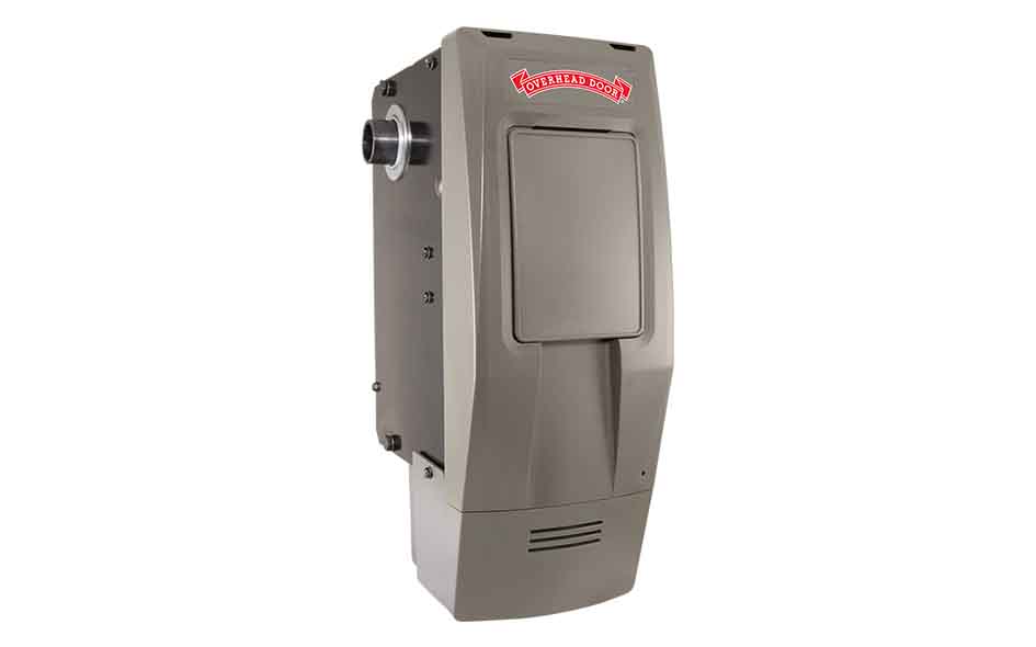 A rectangular, gray metal Wall Mount Garage Door Opener with a small vent and front door, a Forrest Scott logo on top, and a pipe connector on the left side. The unit features a modern, industrial design.